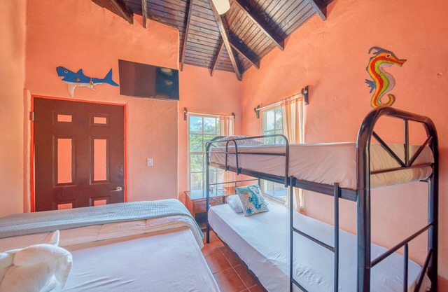 Three bedroom villa.Two private balconies. One full bathroom and 1 1/2 bath.