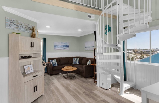Top-floor getaway w/balcony, designated parking, and complimentary activities!
