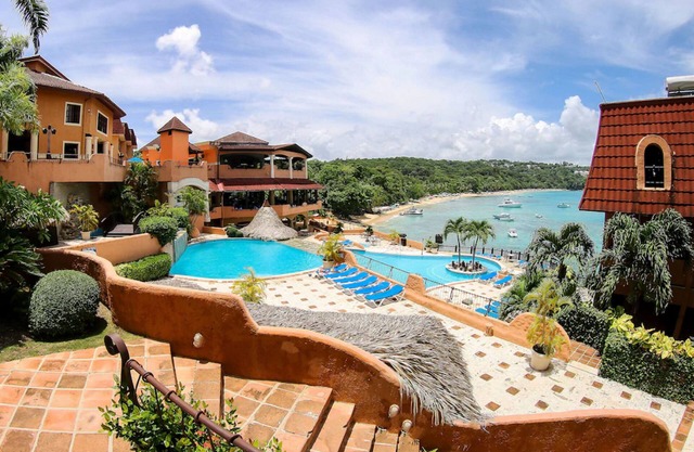 Top-floor hotel room with ensuite bathroom and sea views, central location
