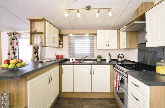Top of the range 12ft-wide caravan with one double and one twin.
