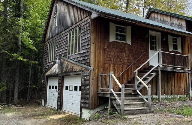 Tranquil cabin in the woods with heated garage.
