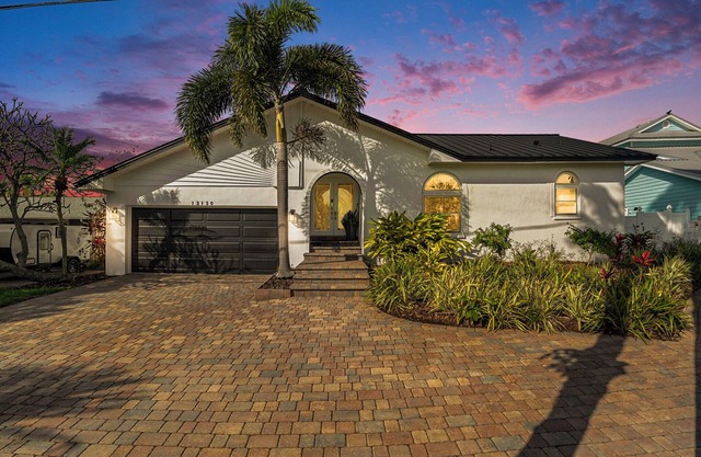 TREASURE ISLAND FLORIDA- Discover your luxury 4 bedroom home on canal fishing