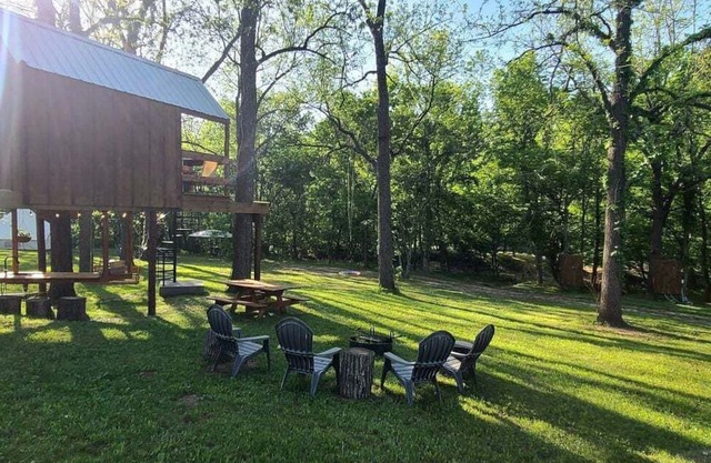 Tree House Glamping Destination near the Ozarks, with River Access for Swimming and Fishing
