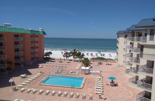 Tropical Beachfront Penthouse-Beach Cottages II