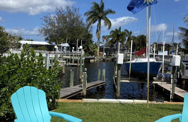 Tropical Getaway! Waterfront Bungalow with Heated Pool, Firepit, & Kayaks