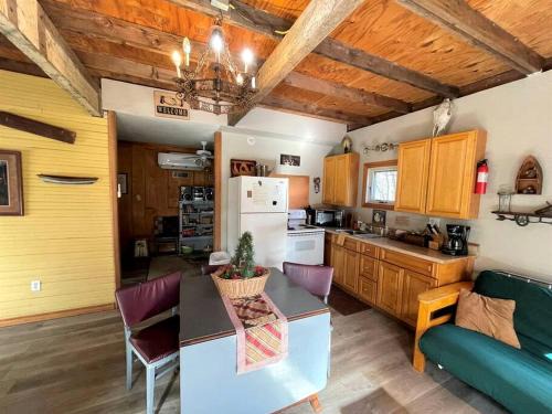 Two-Story Cabin Rental for Large Groups along Hamilton Creek in Marble Falls, Texas