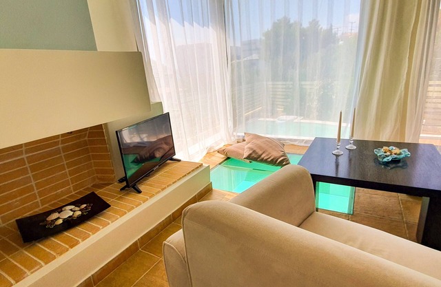 Unique 2 bedroom apartment with garden and pool