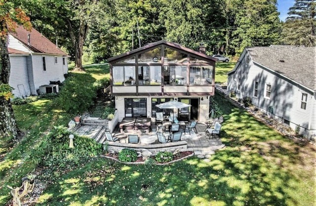 Updated and fully appointed Round Lake waterfront home w/hot tub!