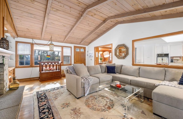 Updated decor, large kitchen, deck overlooking pond, exclusive access to pond