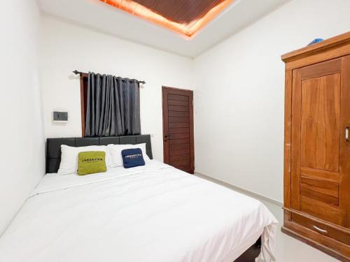 Urbanview Hotel Arta Guna Casa