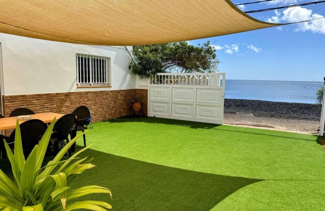 Vacation Apartment 'La Lajita Beach House' with Sea View, Private Terrace and Wi-Fi