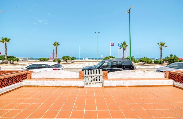Vacation Home "Oliva Primera Linea" with Sea View, Private Terrace & Wi-Fi