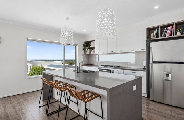 Views On The Hill - Luxurious escape with a heated swimming pool, and stunning views.