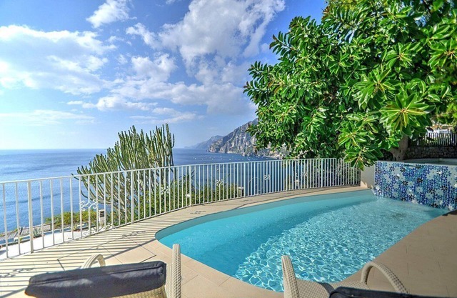 Villa Cleopatra Grande: An elegant and welcoming two-story villa built sheer above the sea, with Free WI-FI.
