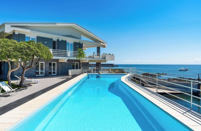 Villa GIULIA is a luxury seafront villa with private pool