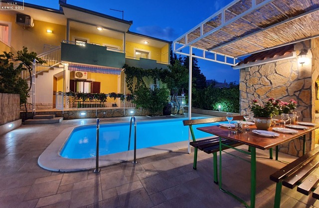 Villa KRNIC SOL in Split, Solin with a heated pool. .