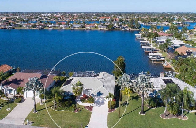 Villa Melima - Stylishly Furnished Lakefront Home with Gulf Access, Amazing Pool Area