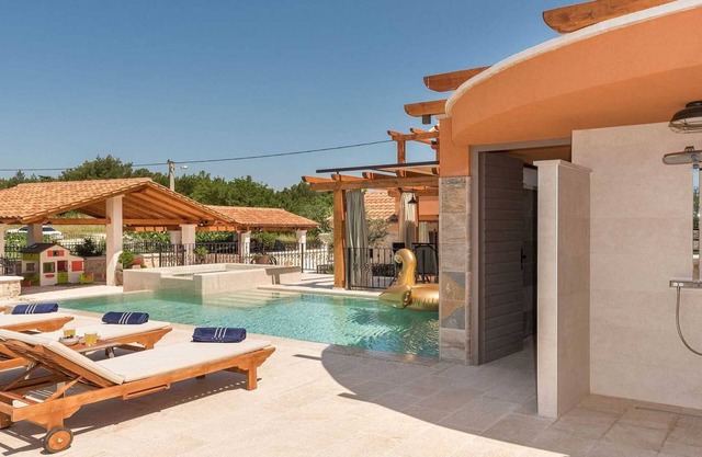 Villa with children's playground in Skradin