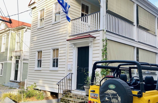 Walk to everything, upper king street area, porch, off-street parking space!