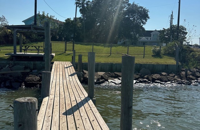Watch amazing sunsets from the 6 person hot tub & private 220’ pier.