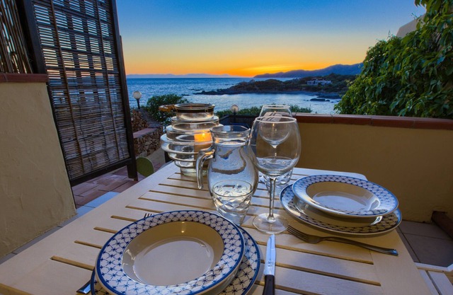 Water front Flat with terraces and with an amazing view over beach, bay, sunset