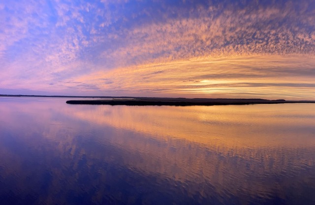 Waterfront campsite, a serene oasis for nature lovers and fishing enthusiasts! n