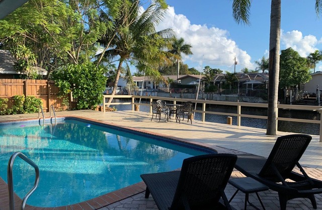 Waterfront Home with a Heated Pool 10 min to the Beach