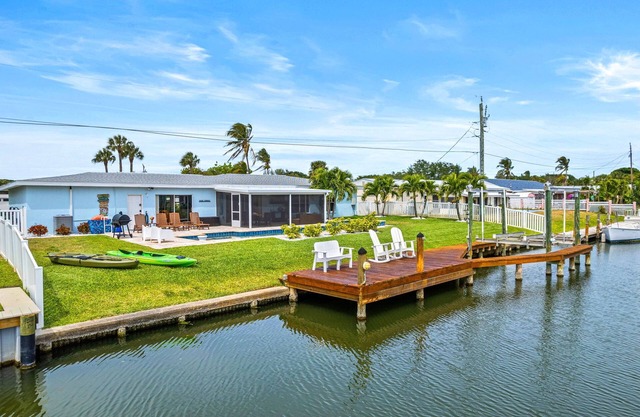 Waterfront Home with Heated Pool & Spa | Dock | 4.5 Blocks to Beach & Downtown