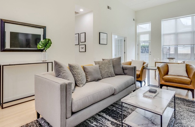 Wells Street WOW! 13 ft Ceilings and a Private Terrace Make This Condo the Perfect Place for Your Chicago Getaway by RedAwning