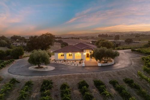 Wine Country Escape w Views Wine Cellar Gym Caterina Dusi Vineyard by AvantStay