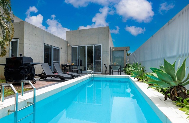 With pool BBQ grill Reserve a stylish 4LDK resort mansion surrounded by nature in Okinawa/Nakagami-gun Okinawa