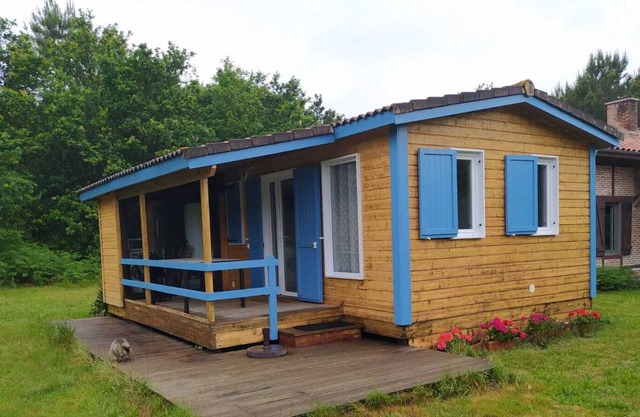 WOODEN CHALET IN THE FOREST CLOSE TO THE OCEAN