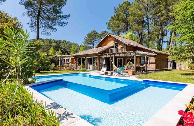 Wooden villa with heated pool