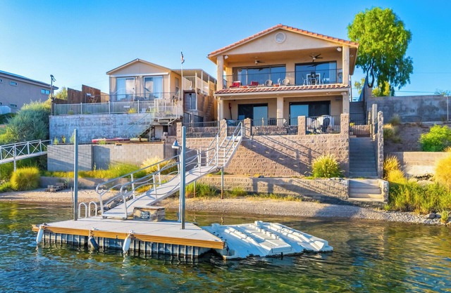 Wow! Amazing Riverfront Home with Boat Launch Next Door!