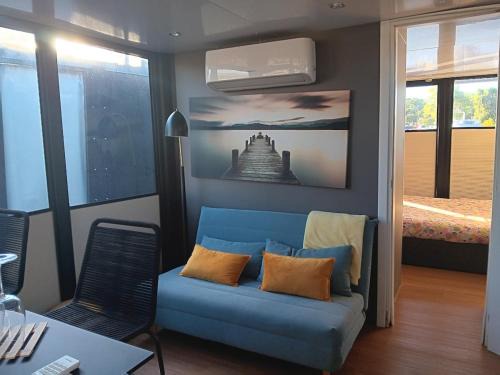 Yellow houseboat on Lake Maggiore