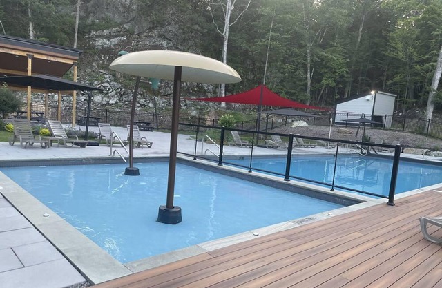 You’ll fall in love! Brand new family unit at Mont Owl’s Head with a dock!