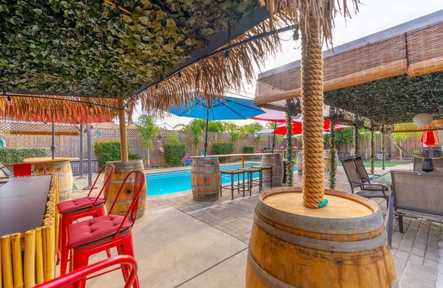 YouTube:TropicalParadiseFresno.Pool/Grill/Outdoor Cinema/OutdoorHeaters.PetFrien