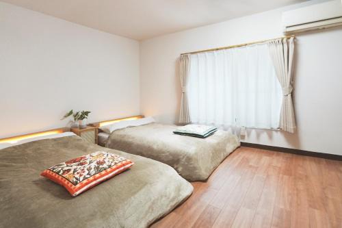 Naniwa Villa | 心斎橋まで7分 なんば1駅 Meeno Home 汐見 一軒家貸切 親子向けファミリー民泊