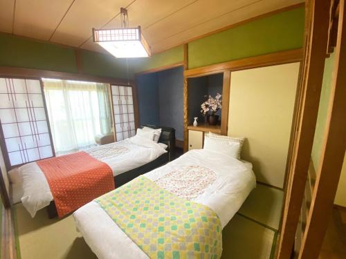 Yufu House | 鉄道と山の見える家