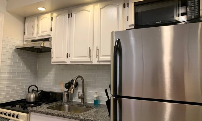 Industry Apartment | 1631 1D · Astounding Apt/20 min to NYC-Parking Avail. Steps away from bus stop.