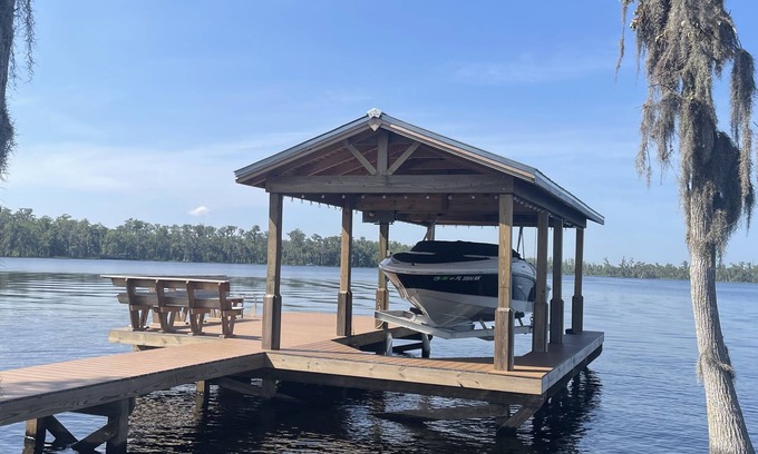 Clermont House | 2 bed 2 bath on Clermont chain of lakes with dock & boat lift Emerald Lakes 55+