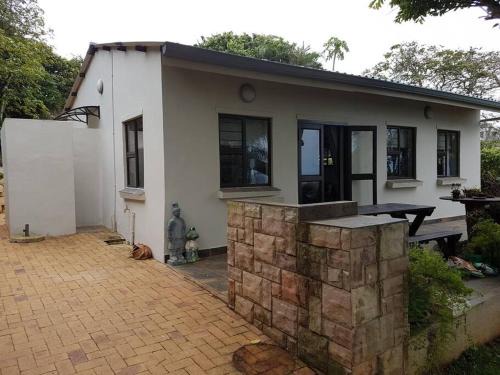 Shaka's Rock Apartment | 2 Bed cottage with sea views and lovely gardens