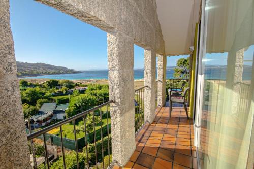 Cangas Apartment | 2 bedrooms apartement at Vilanova 100 m away from the beach with sea view enclosed garden and wifi