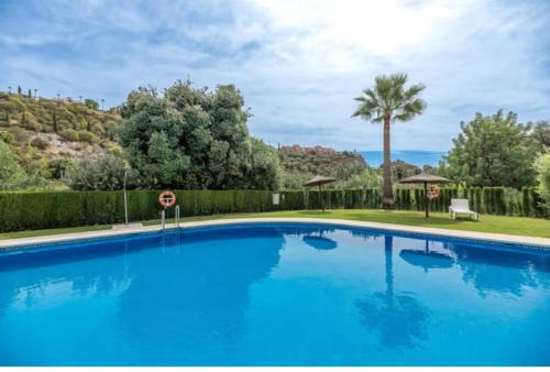 Benahavis Apartment | 2 Bedrooms - Sleeps 4 - Garden and Pool with View