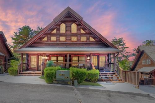 Pigeon Forge House | 2 Miles from Dollywood Family Resort with Seasonal Outdoor Swimming Pool, Year around Heated Indoor Swimming Pool, Townhome Style Cabin, Private Hot Tub, Arcade, TV, Wifi, Kitchen with Refrigerator, Washer and Dryer
