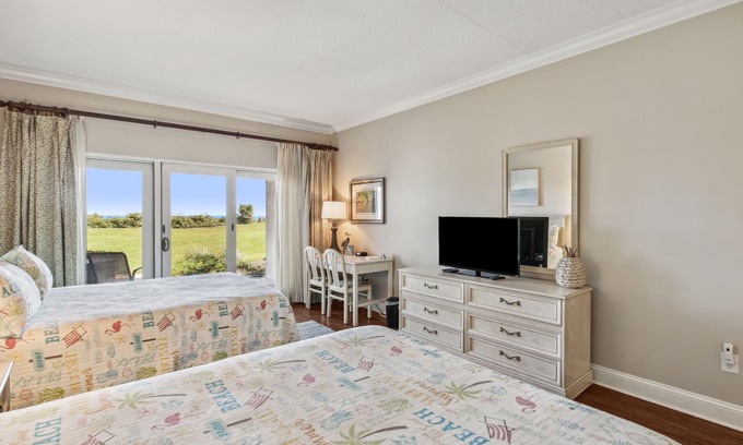 Fernandina Beach Condo | 256 Sandcastles Beautiful Oceanfront, Ground Floor Hotel Room & Private Patio