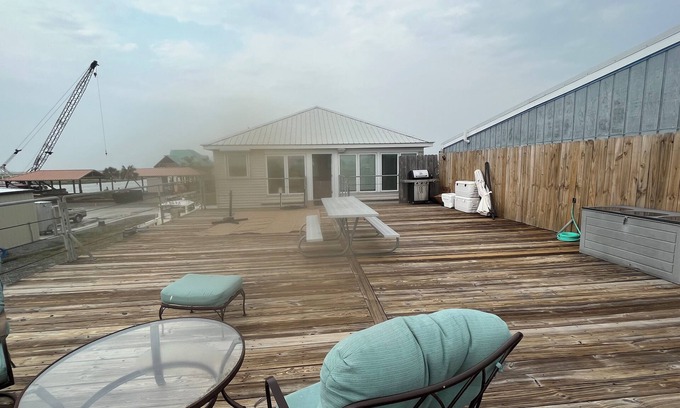 Cocodrie House | 2800 Sq.Ft Camp in Coco Marina includes Golf Cart and 2 boat slips