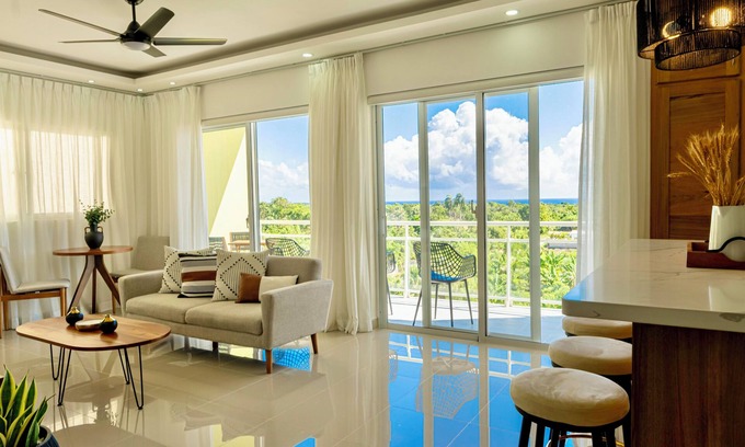 Cabrera Apartment | 5 min to the beach! Pristine ocean view apartment - Gated community with parking