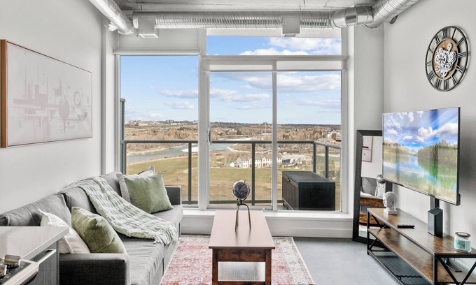 East Village Apartment | 5 min Walk to Saddledome | King Bed | Sofa Bed | AC | Beside Fort Calgary