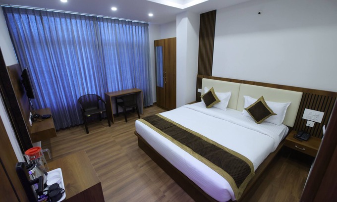Mysore Hotel | ADITHI COMFORTS INN AND SUITES